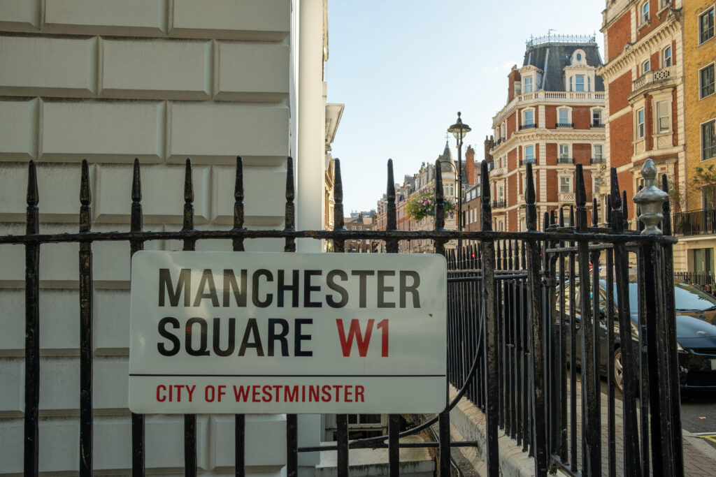 A London street sign saying Manchester Square W1