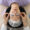 The top view of a woman getting eyelash extensions, she is having eyelash patches put on.